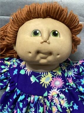 Vintage-Inspired Kids Doll with Orange Hair and Floral Dress